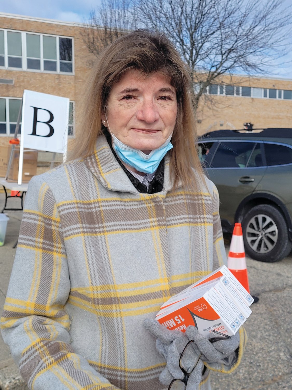 NEW COMMITTEE MEMBER: Marysue Andreozzi, Johnston School Committee's newest member, was on hand several weeks ago to hand out free test kits in the freezing cold.